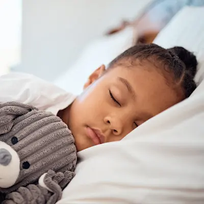 Young girl sleeping peacefully.