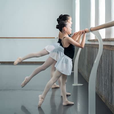 Young girl practicing ballet.