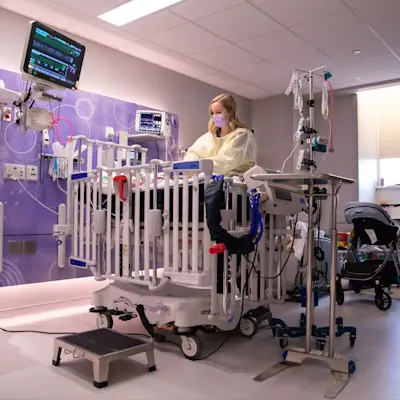 Provider caring for young patient in the CCU.