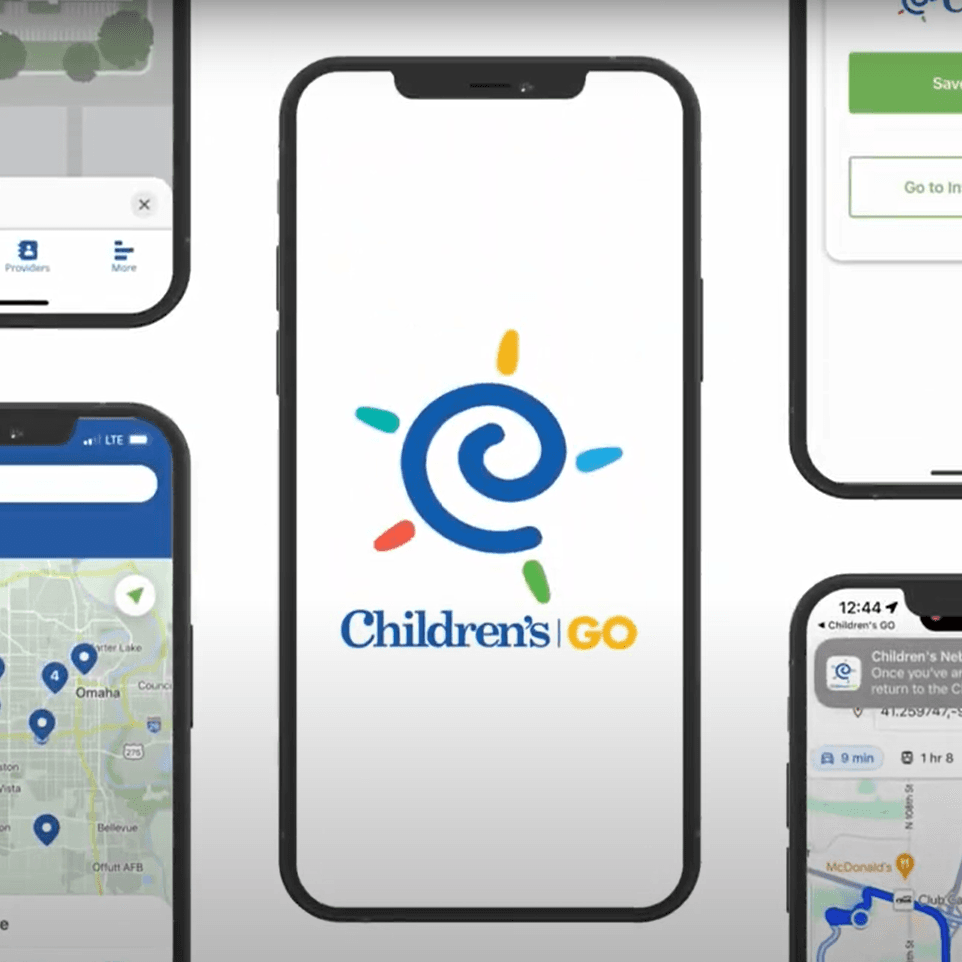Photo of Children's GO wayfinding app on a phone.