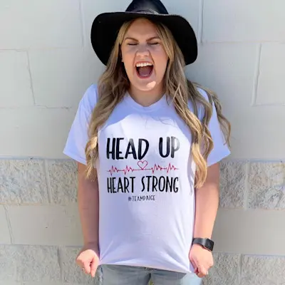 Paige, a Children's Nebraska patient, smiling and thriving as an adult.