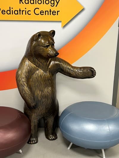Bear statue guiding the way in the Specialty Pediatric Center.