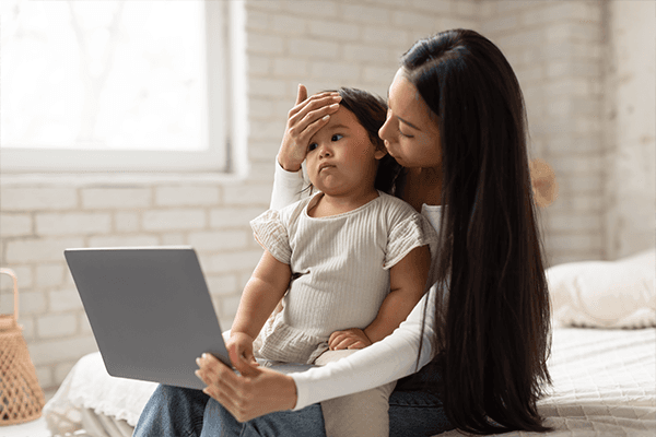 Korean Mommy And Infant Video Calling Having Medical Checkup Indoor