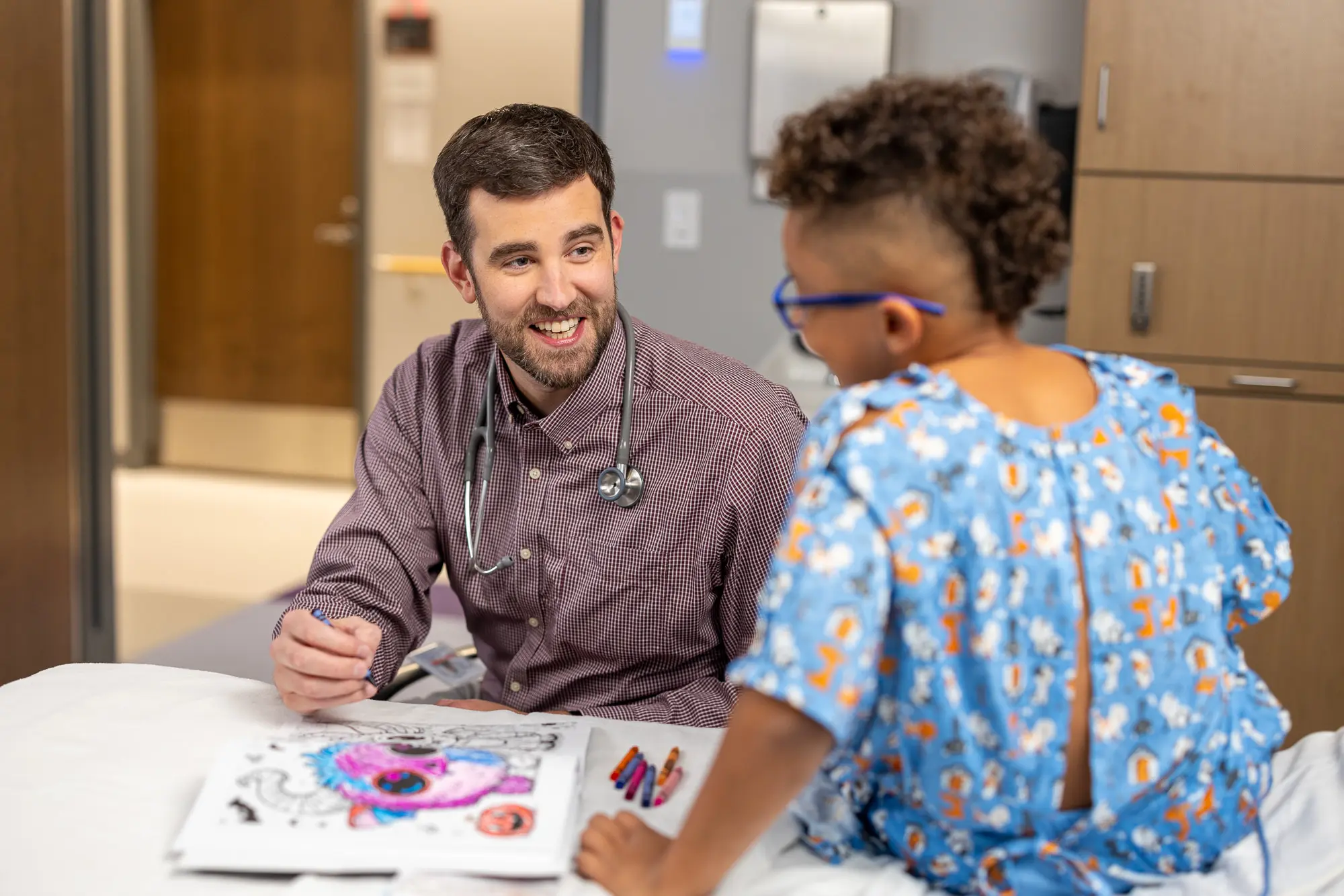 Provider working with child.