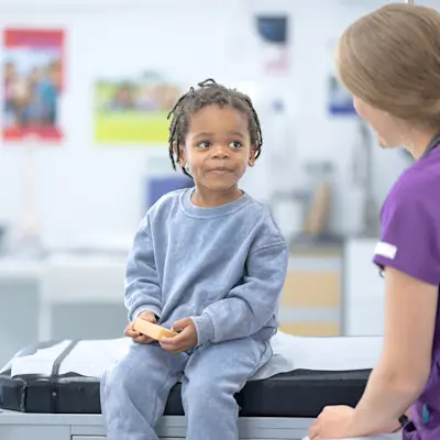 Provider working with young patient.
