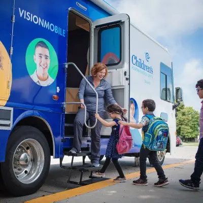Students entering the Visionmobile for an eye exam.