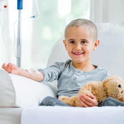 Child receiving chemotherapy infusion.