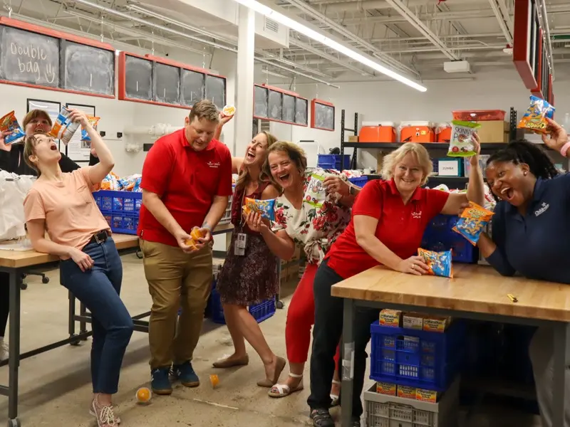Group of KIDS Nebraska volunteers and Children's Nebraska team members.