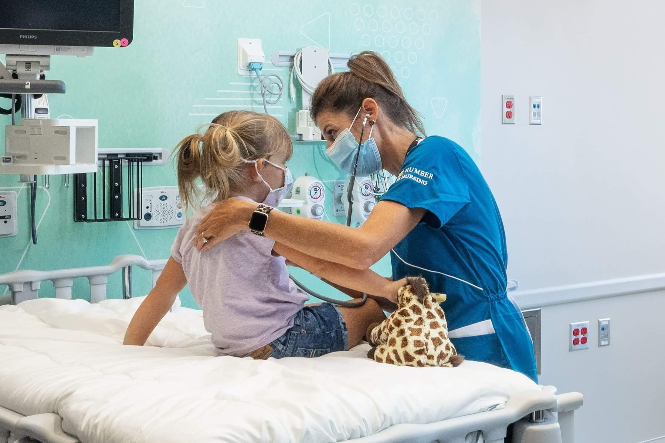 Medical provdier working with child