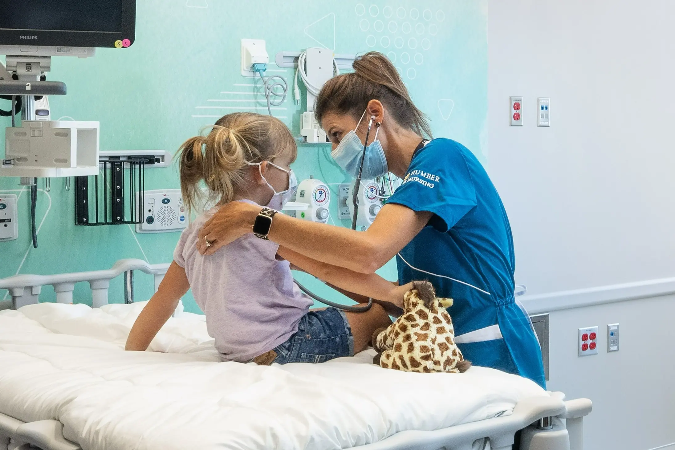 Medical provdier working with child